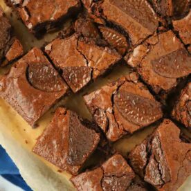 A board with squares of Chocolate Orange Brownie on.