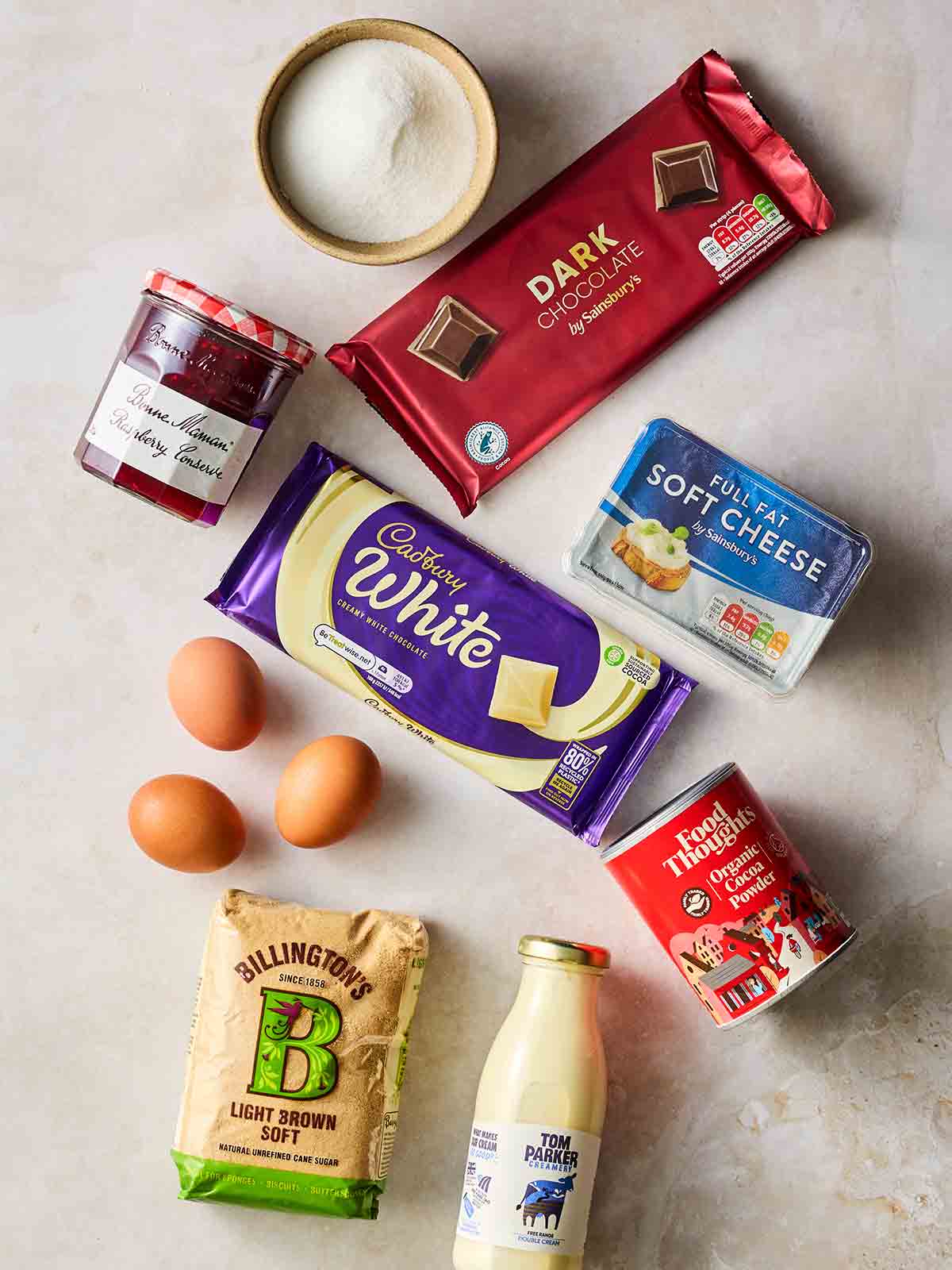 Ingredients for making a Yule Log laid out on a white surface.