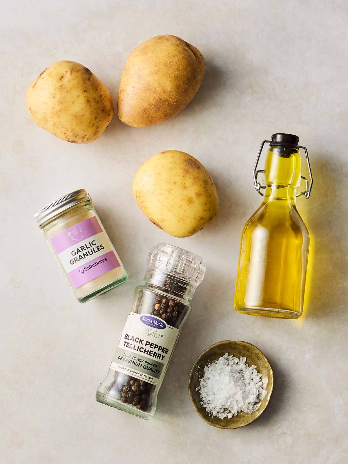 The ingredients for making homemade chips laid out on a white surface.