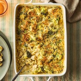 An oven dish with a one pan Chicken Kiev Pasta inside, ready to serve onto plates.