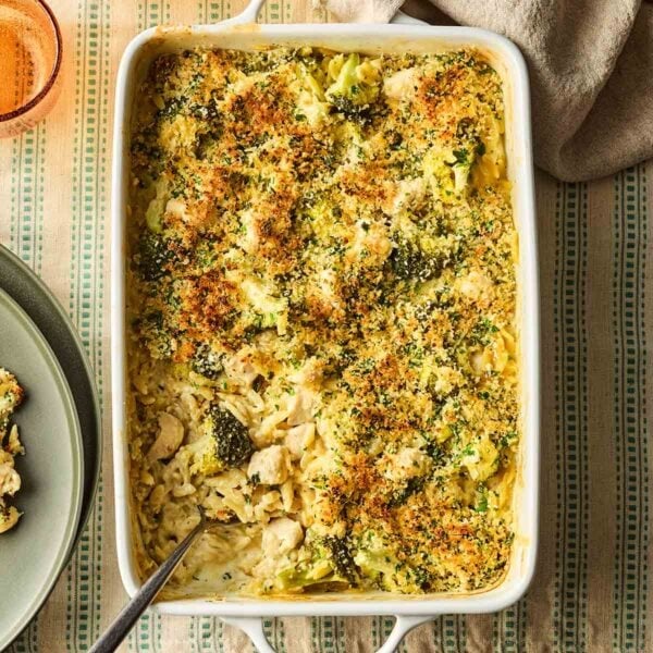An oven dish with a one pan Chicken Kiev Pasta inside, ready to serve onto plates.