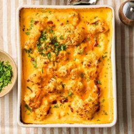 Looking down on a very cheesy Cauliflower Cheese, cooked and ready to serve.
