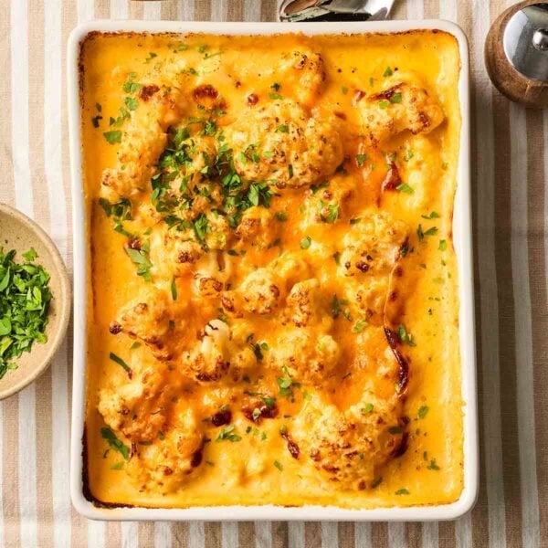 Looking down on a very cheesy Cauliflower Cheese, cooked and ready to serve.