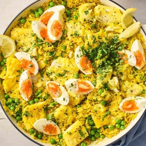 A pan of Kedgeree, ready to be served onto plates from the table.